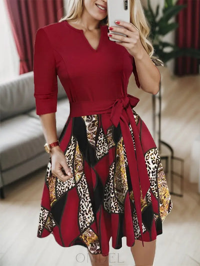 Plus Size Printed Tie Front Notched Long Sleeve Dress Trendsi OMDEL.COM