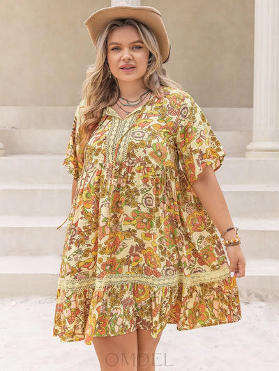 Plus Size Printed Tie Neck Short Sleeve Mini Dress Trendsi OMDEL.COM