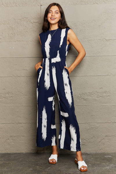 Perfee Printed Round Neck Cutout Jumpsuit with Pockets - OMDEL.COM